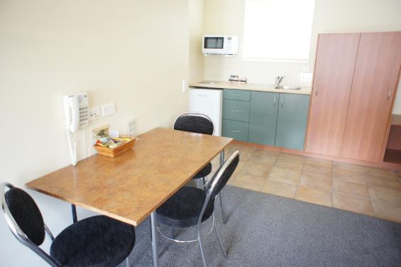 One-Bedroom Access Unit - dining table